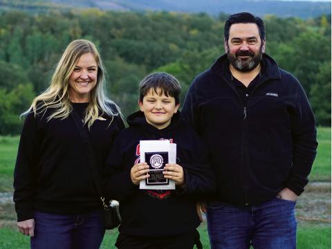 Chris, Cooper and Al Berry of Birchwood Chevrolet took home awards for best customer service and best auto or ag dealer in the region. Photo by Larry Stokke