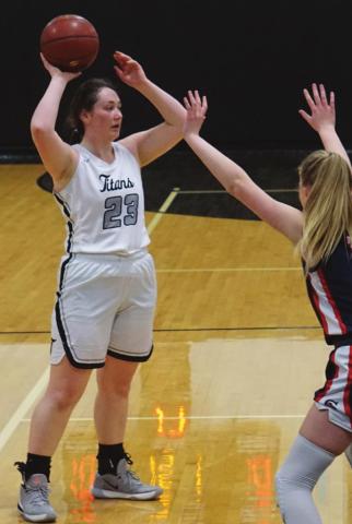 Madison Hermanson loks for an open team mate in action in Edinburg Saturday. VNV photo by Erich Hoyles