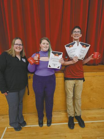 Speech coach Jamie Rarick with DPS winners Stephanie Kissee and Jonah Rarick. Submitted photo