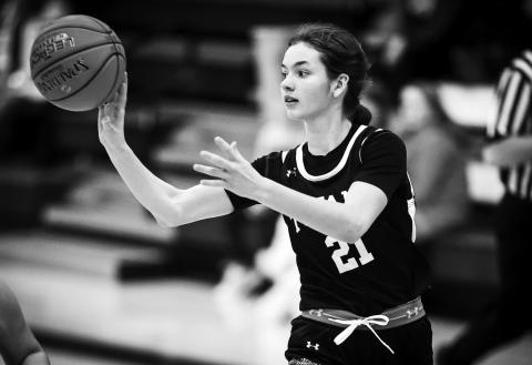 Elizabeth Fedje makes a pass at Hillsboro on Dec. 6. Photo by Cole Short - Hillsboro Banner.