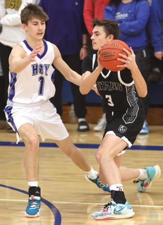 Calvin Otto works the ball past Hillsboro Central Valley's Micah Longthorne. Photo by Lyle Van Camp