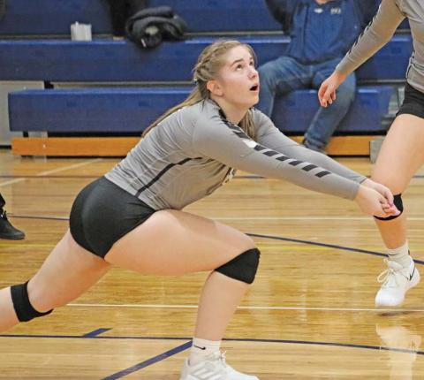 Kiara Aasand gets ready to bump the ball accross the net at North Border last week. Photo submitted by Kerri Stegman Drayton Public School