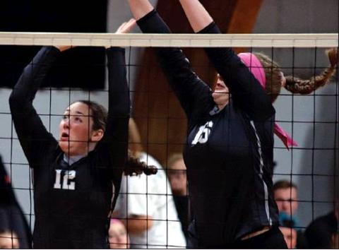 Madison Hermanson and Maria Myrdal go up for the block against the Grafton Spoilers last Thursday in Crystal. VNV Photo by Lesa Van Camp