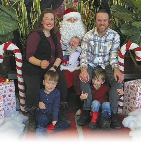 CEO Tim Chapman and family with Santa. Submitted photo.