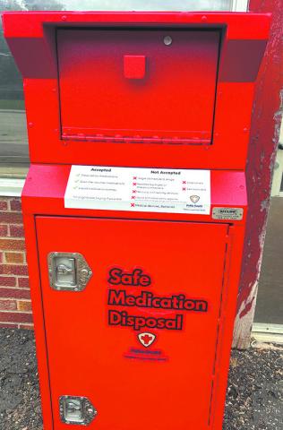 The medication take back box is located in front of the former Hillier Tire building on Main Street. Photo by Andrea Johnston