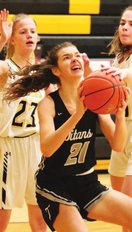 Elizabeth Fedje tries to shoot through two Park River defenders. VNV photo by Lyle Van Camp