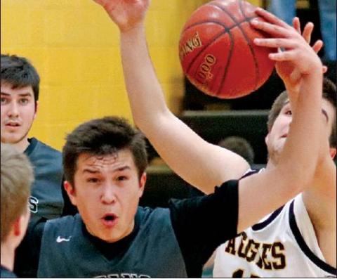 Gage Pollestad and Seth Nelson fight for possession of the ball during the double header Monday night in Park River against the Aggies. VNV Photo by Lesa Van Camp