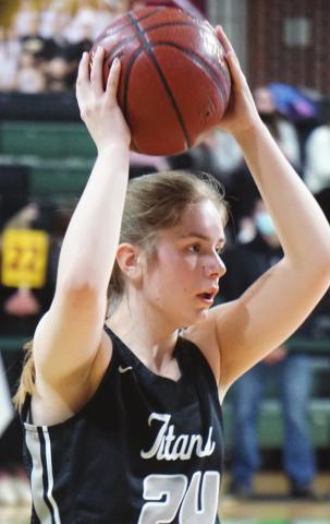 Kiara Aasand looks for an open Titan late in the game against the Spoilers Monday. VNV photo by Lyle Van Camp