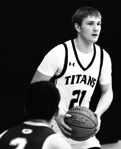 Cayden Quibell looks for an open teammate in action against Grafton last week. Photo by Lyle Van Camp.