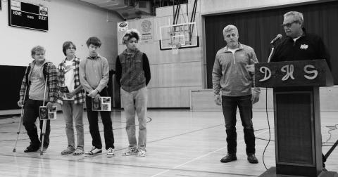 Boys’ track, from left to right: Bryce Wimpfheimer, Jonathan Knutson, James Larocque, Mason Pollestad, Coach Tucker, Coach Thompson. Photo by Lyle Van Camp.