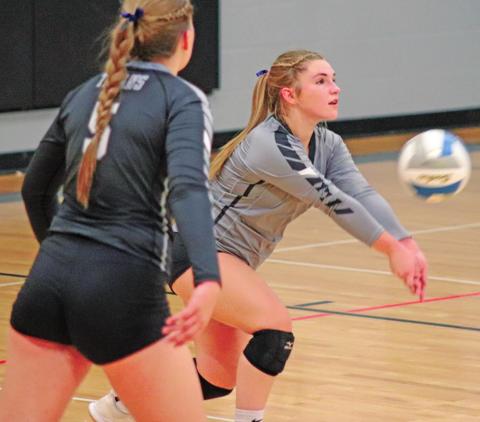 Libero Gwyneth Wieler bumps the ball to the Hatton - Northwood Thunder Tuesday Night in Drayton. VNV Photo by Lesa Van Camp