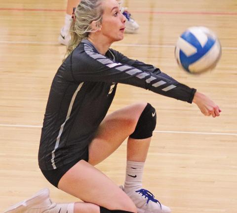 Kendra Hannesson gets under the ball to bump it during a volley against Polar Bears on Saturday. VNV Photo by Lesa Van Camp