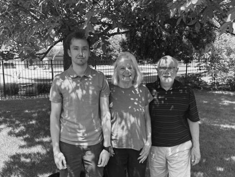 Danylo Hoshko (left) with Mary Ann and Gary Ouradnik, who sponsored the Danylo and his mother and grandmother to come to live in North Dakota.