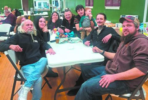Chris Auen (far left) and his family at the fundraiser benefit last Saturday, Jan. 11. Photo by Christine Jensen