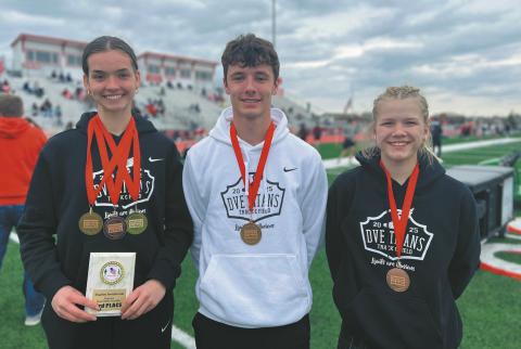 Left to right: Elizabeth Fedje, Brady Reilly and Alyssa Hoyles at Fargo Shanley Invitational. Photo courtesy of Jodi Fedje