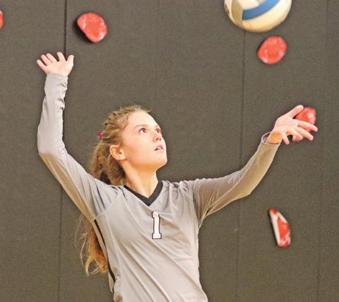 Katelyn Oberg serves the ball to start the volley with MPCG last Thursday evening. VNV Photo by Lesa Van Camp