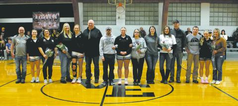 Together with their parents, seniors Greta Burrell, Easton Larson, Aleah Pokrzywinski, Hannah Myrdal, and Reese Fering were recognized on Senior Night before the game in Crystal Jan. 24. Photo by Jamie Rarick