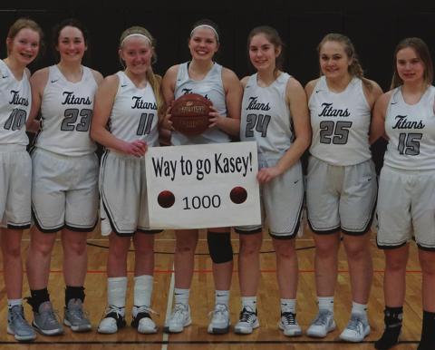 The Magnificent Seven, D-VE Titans, pose after their game against Heritage Christian School on Saturday afternoon. Pictured left to right: Eastan Larson, Madison Hermanson, Meghan Lorton, Kasey Stegman, Kiara Aasand, Ella Kittelson, and Aleah Pokrzywinski. VNV photo by Lyle Van Camp