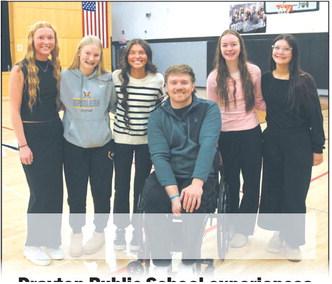 Peyton Larson, Nulla Thompson, Mikala Mccoy, Jocelyn Vold, and Maia Hermanson shared a moment with Hunter Pinke following Thursday's visit. There was a good-natured rivalry before the evening's game against Hatton Northwood, where Pinke’s sisters play basketball. Photo by Jamie Rarick