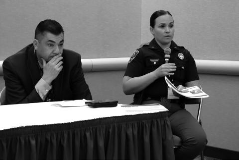 North Dakota Highway Patrol Lt. Jenna Clawson Huibregtse, right, special programs coordinator for safety and education for the department, speaks next to Phil Packineau, left, public safety administrator for the Mandan, Hidatsa and Arikara Nation, on new alerts being added to the state’s emergency system during the Government-to-Government Conference on June 5, 2025. Photo by Michael Achterling/North Dakota Monitor