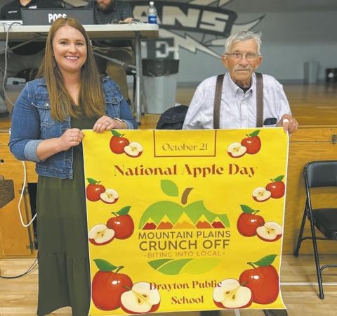 School Nurse, Kallie Christenson and apple-growing expert Bob Merrill. Photo by Rachel Lee.