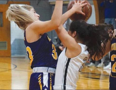 Grace Kertz fights for control of the ball with a Rolla defender. VNV Photo by Lesa Van Camp
