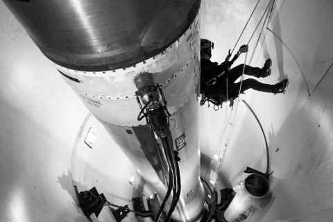 An Air Force firefighter repels down a training missile silo during a training exercise at F.E. Warren Air Force Base in Wyoming on Oct. 26, 2024. Photo by Hunter C. Kirkland/U.S. Air Force