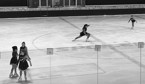 Amelia glides across the ice during the Basic 5 portion of the Grafton Figure Skating Show, “Go for Gold.” Photo by Rebecca Davis