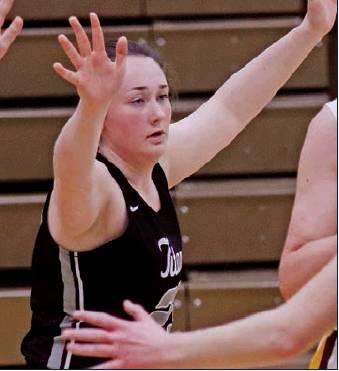 Pictured left: Madison Hermanson guards a Spoilers player to keep them from getting to the basket last Tuesday night. VNV Photo by Lesa Van Camp