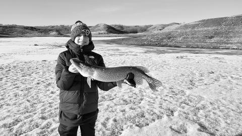 14 year old Jack Ressler with a pike from Hazen Bay. Photo by NDGF Ashley Peterson.
