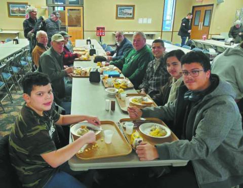 DeSousa boys enjoying breakfast together a the Bible camp in Devils Lake; Noah, Daniel, and Lucas. Submitted photo