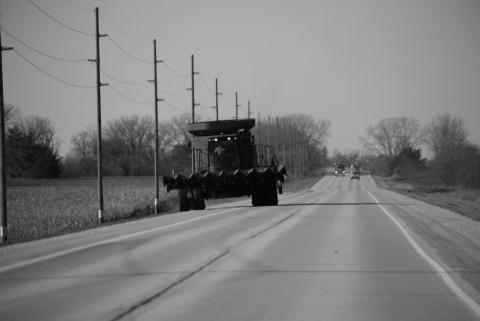As agricultural producers prepare for harvest season, it is crucial for motorists and farm equipment operators to share the road to prevent roadway collisions. (Photo by Central States Center for Agricultural Safety and Health (CS-CASH))
