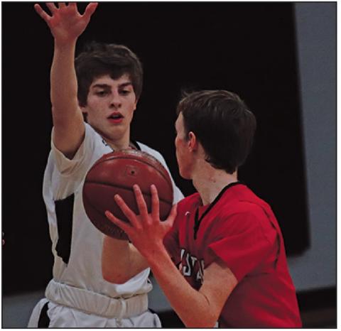 Sam Johnson tries to keep a Mustang from scoring. VNV Photo by Lesa Van Camp
