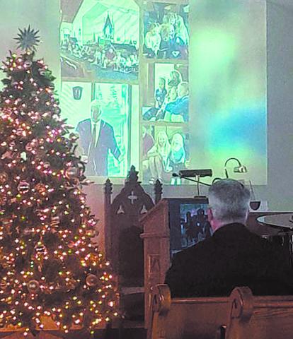 A video slide show was presented in honor of Dryburgh. Images and music were selected by Kris Heine and they were assembled by Tracy Giles. Photo by Christine Jensen