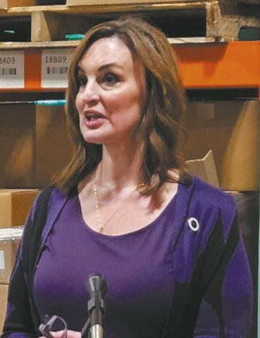 Robin Nelson speaks during an event at the Great Plains Food Bank on Dec. 19, 2024. Photo by Jeff Beach/North Dakota Monitor