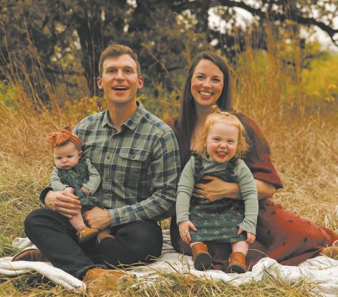 Levi and Rachel Bachmeier with daughters Roslin (left) and Linden (right).