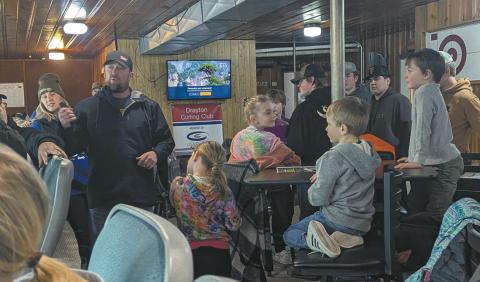 Tom Grzadzieleski introduced a short video on the sport of curling. Submitted photo
