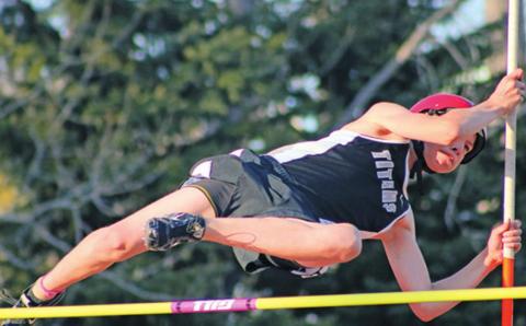 Gavin Ryan soars over the bar in the pole vault. Photo submitted by Drayton Public School