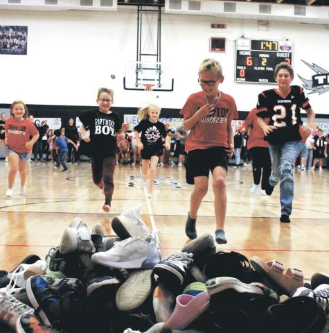 Elementary students got in on the homecoming fun with a shoe relay as part of Friday’s homecoming games. Photo by Jamie Rarick.