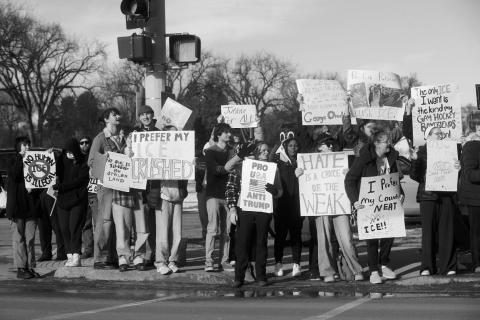 Demonstrators stand in front of the North Dakota Capitol in Bismarck on Jan. 11, 2026, during an ICE Out for Good rally in response to the killing of Renee Good by Immigration and Customs Enforcement agent Jonathan Ross in Minnesota. Photo by Kyle Martin/For the North Dakota Monitor