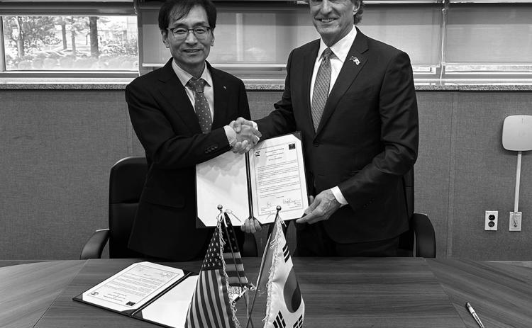 North Dakota Gov. Doug Burgum and Korea Research Association for Unmanned Vehicles (KRAUV) Chairman Choi Myung-Jin sign a memorandum of understanding to establish a partnership and promote collaboration in Unmanned Aircraft Systems (UAS) research and development on Tuesday, Oct. 15, 2024, in Seoul, Republic of Korea, as part of a trade and investment mission to the ROK. Submitted photo