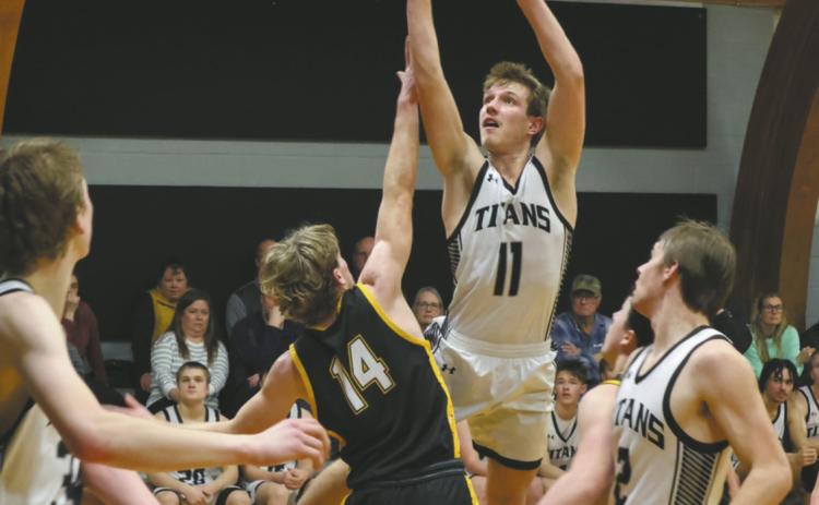 DVE senior Isaac Feltman releases the ball past PRFL defender Luke Shirek. Photo by Jamie Rarick
