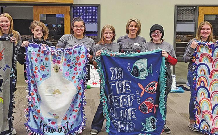Pictured above with their blankets (L to R): Chapter Vice President Kiara Aasand, Easton Larson, Stephanie Kissee, Aaliyah Lorenzen, Alyssa Hoyles, Chapter Adviser Sarah Hillier, Chapter President Jordie Praska, Rylee Maurstad, Alyvia Quibell, Taylor Hermanson. Photo submitted