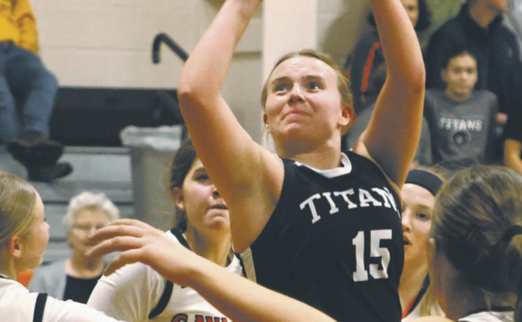 Aleah Pokryzwinski shoots through a crowd in action at Cavalier last week. Photo by Lyle Van Camp