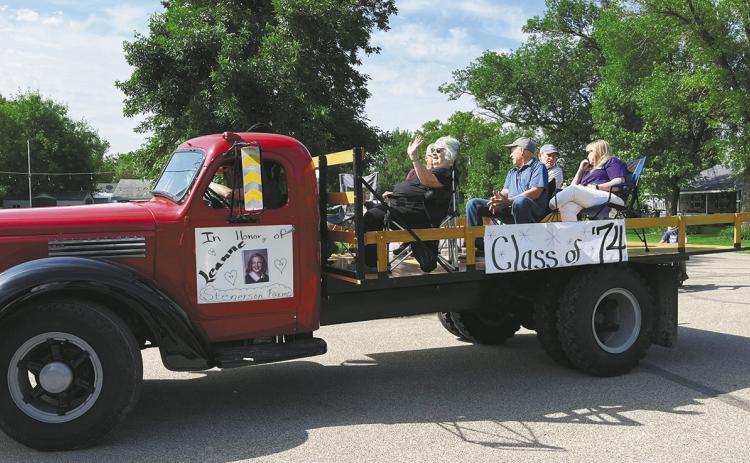 The class of 1974 dedicated their float to a lost classmate at the St. Thomas Daze parade. Photo by Kathryn Sisk