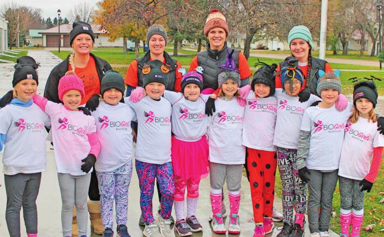 The BIO girls pose for a picture before starting their 5K run. Pictured left to right are: front row Shea Aasand, Evie Hillier, Molly Grundstrom, Marissa Grundstrom, Paige Tunks, Lana Kalka, Ruthie Rarick, Hailey Ladouceur, Brynlee Christenson, and Natalie Helm. Back row: Katie Dahl, Stephanie Woinarowicz, Christie McFarland, and Maggie Vold. Photo submitted by Jamie Rarick