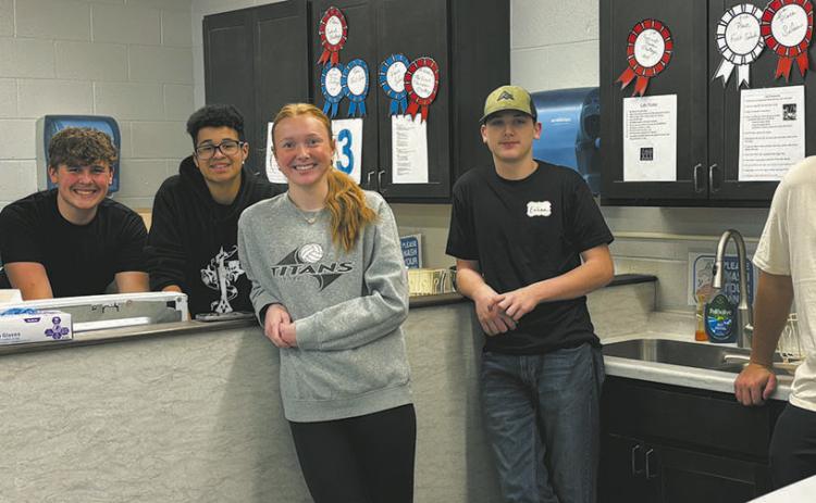 FCCLA students along side National Honor Society students served turkey sandwiches, two types of soup, chips, cookies and a drink from the FACS room. From left to right: Loki Sylskar, Ethan Lund, Jerimiah Johnson, Peyton Larson, Ethan Sherrill, and Daniel De Souza Photo by Andrea Johnston