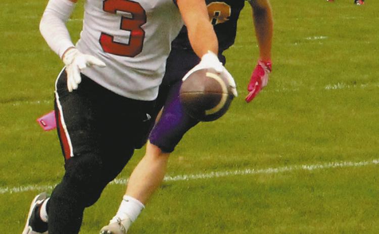 Trenten Keena extends the ball over the plane for a Bomber touchdown. Photo by Jamie Rarick
