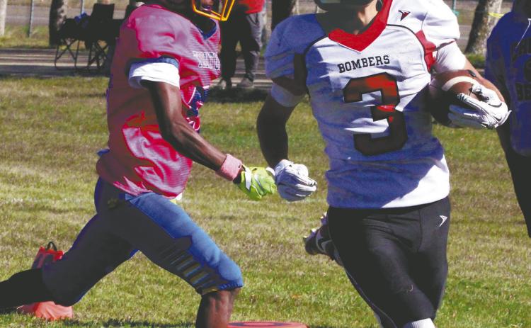 Scoring the first touchdown of the game, senior Trenten Keena runs into the end zone. Photo by Jamie Rarick
