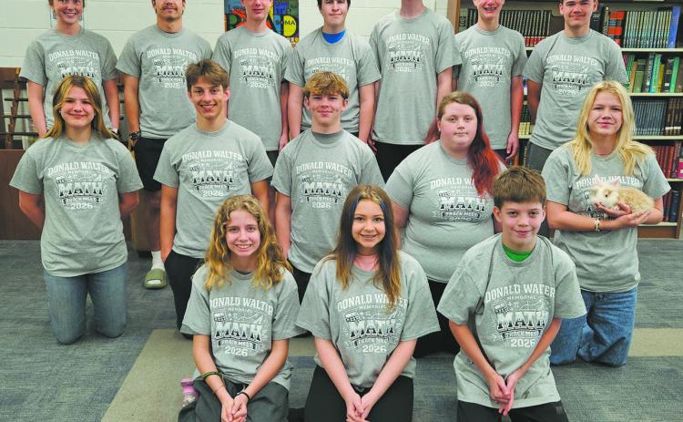 Students who competed in the Don Walter Memorial Math Track Meet in March received their earned rewards last week, as t-shirts arrived in their individual sizes. Back: Peyton Larson, Trenten Keena, Cameron Gunderson, Loki Sylskar, Jonah Rarick, Carsen Gunderson, Max Foss-Pokrzywinski Middle: Violet Hoyles, Carter Johnson, Shawn Patterson, Stephanie Kissee, Alyssa Hoyles (Holding “Team Mascot” Grogu) Front: Ruthie Rarick, Lana Kalka, Nicholas Passa. Photo by Jamie Rarick
